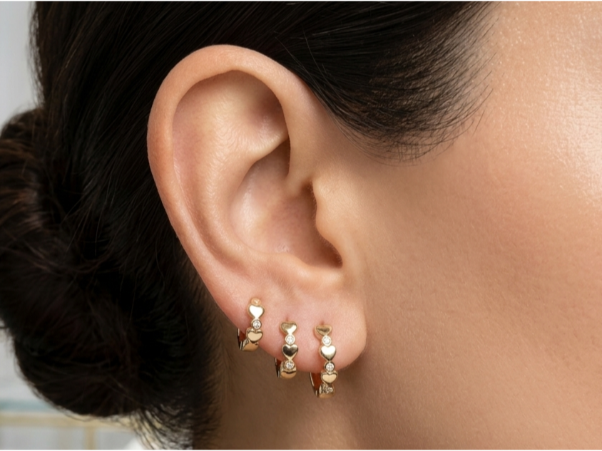 Set de argollas MC baño 18k con chispas y corazones