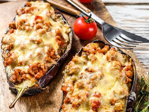 Berenjenas rellenas de arroz, vegetales y queso gratinado (Copia)