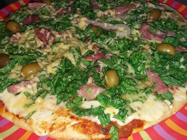 PIZZA CON RUCULA