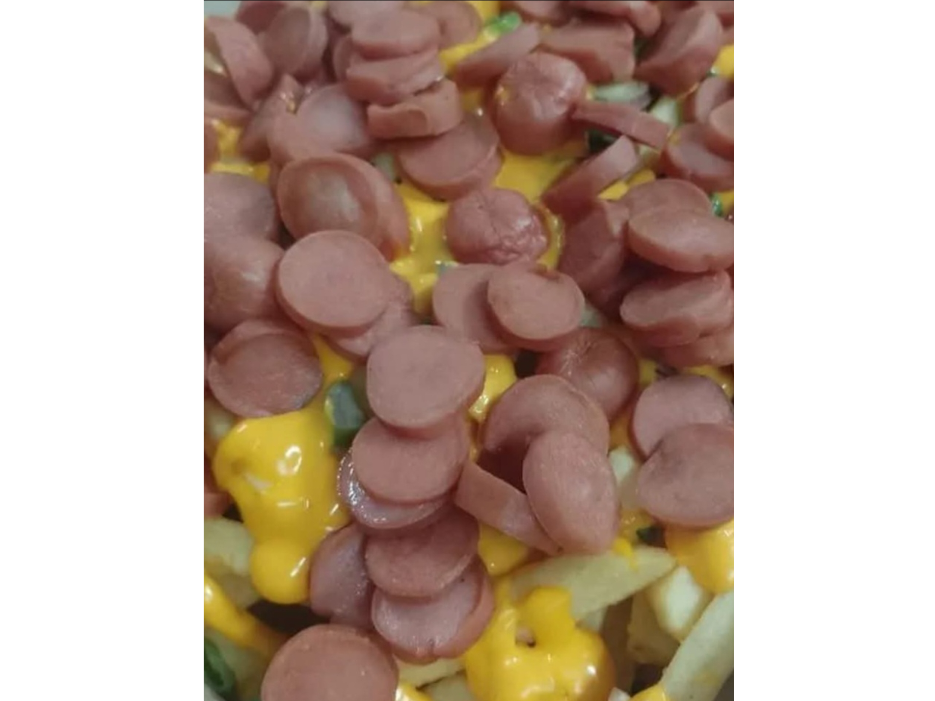 Salchipapas con 1 aderezo