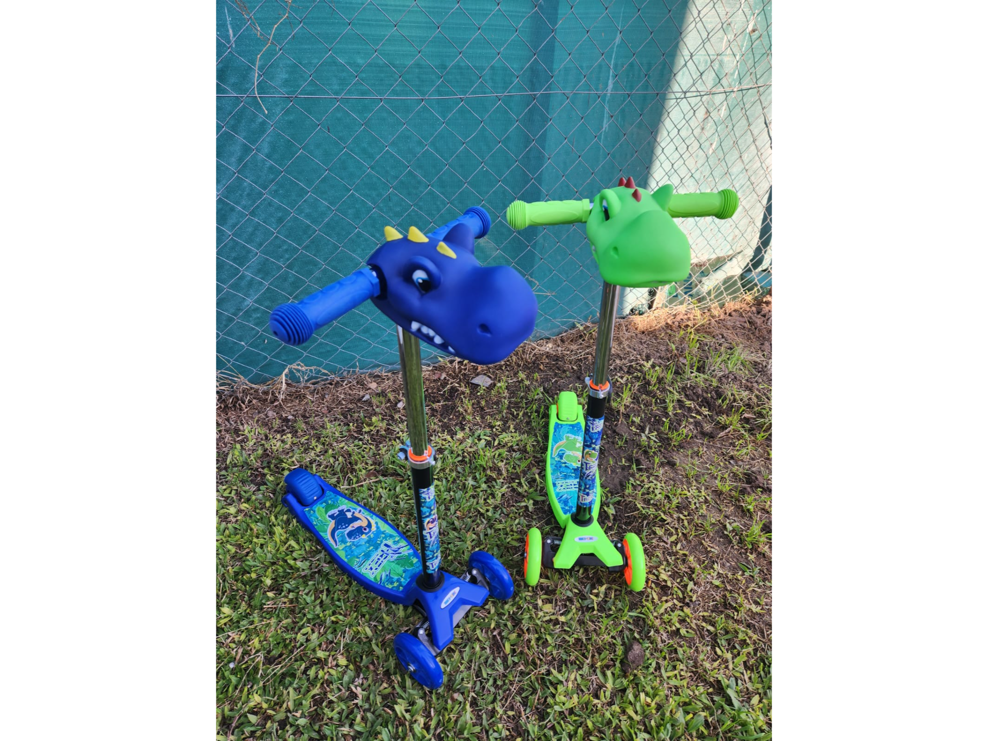MONOPATIN INFANTIL CN CABEZA DINOSAURIO