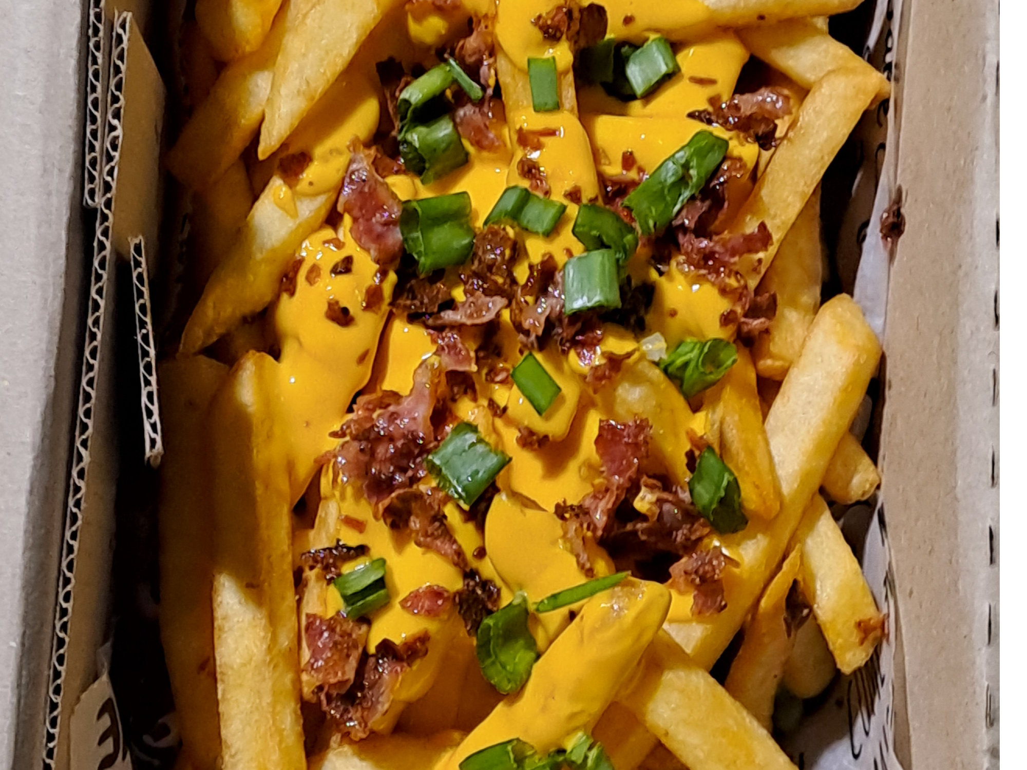 Papas cheddar y bacon