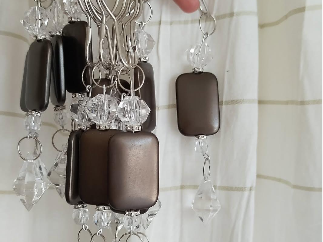 Ganchos para cortinas de baño