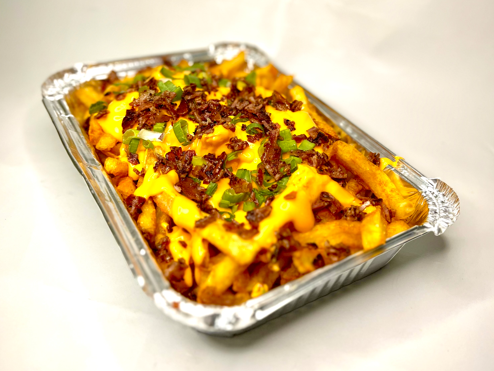 CAJA DE PAPAS CON CHEDDAR Y PANCETA