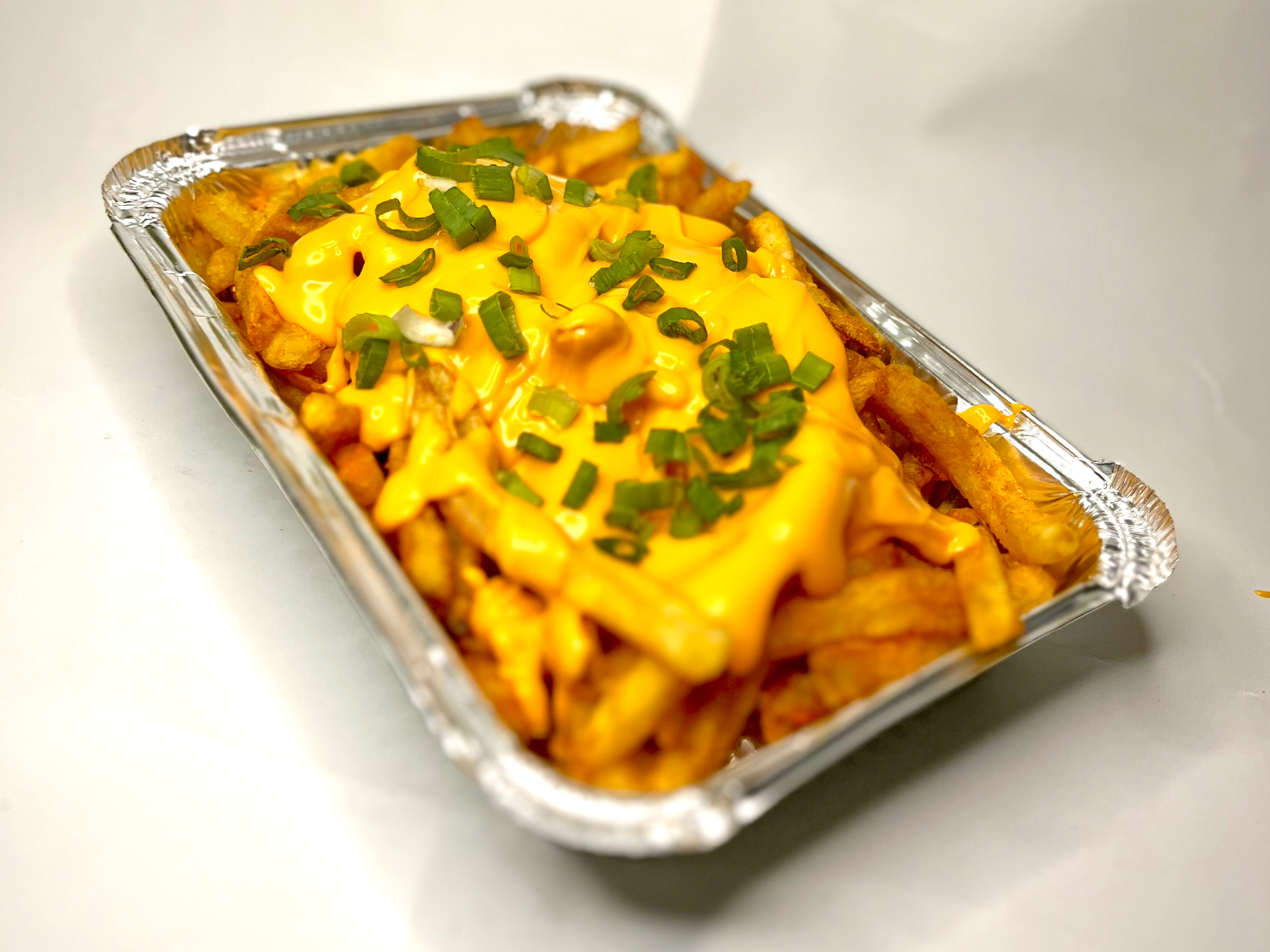 CAJA DE PAPAS CON CHEDDAR