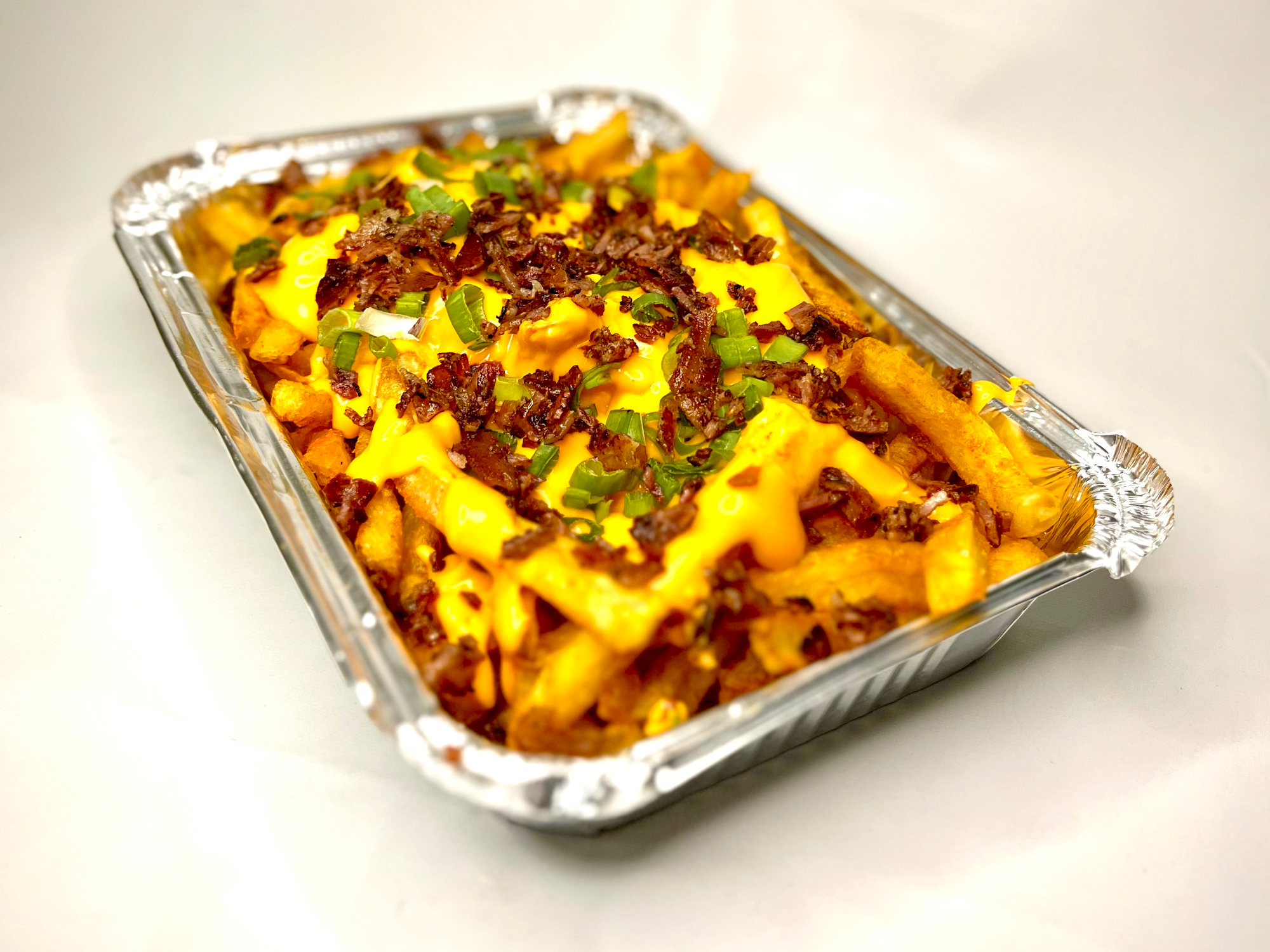 CAJA DE PAPAS CON CHEDDAR Y PANCETA