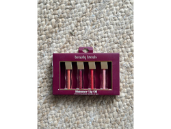 KIT 4 ACEITES LABIALES BRILLANTES DE BEAUTY TREALS