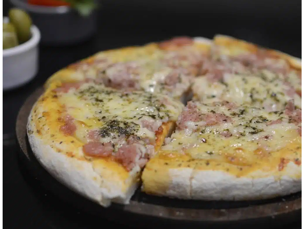 Muzzarella/ Especial con jamón  o 4 quesos