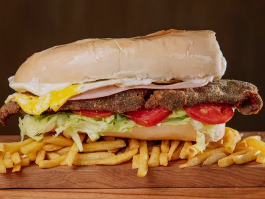 2 Sandwich de milanesa + papas.