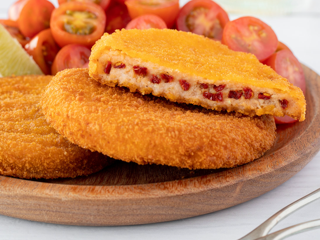 Hamburguesa de merluza tomate