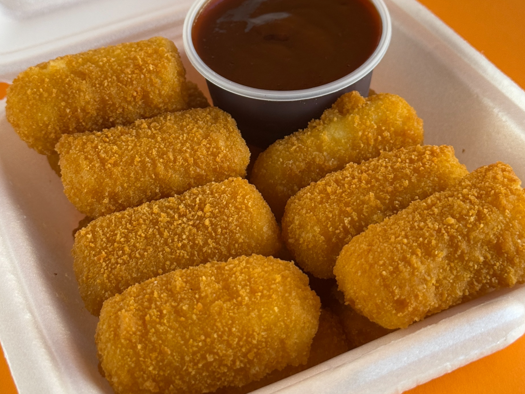 15 bastoncitos de muzarella con dip a eleccion