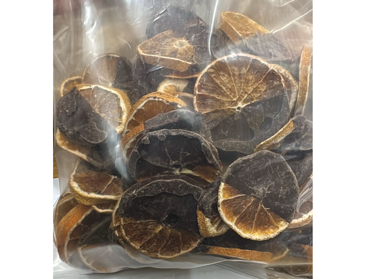 NARANJAS EN RODAJAS BAÑADAS EN CHOCOLATE SEMIAMARGO x 100 GRS