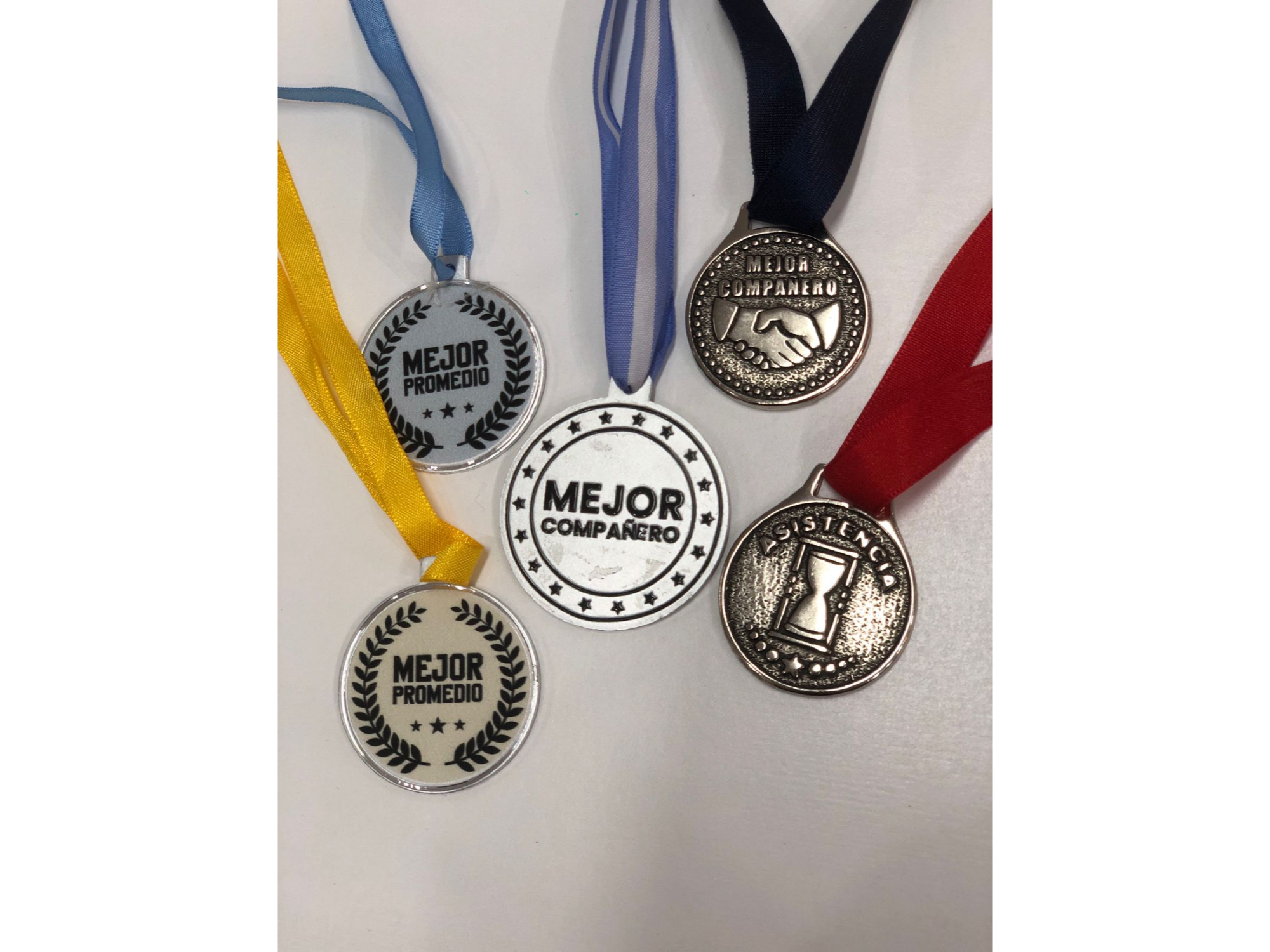MEDALLAS MENCIONES UV