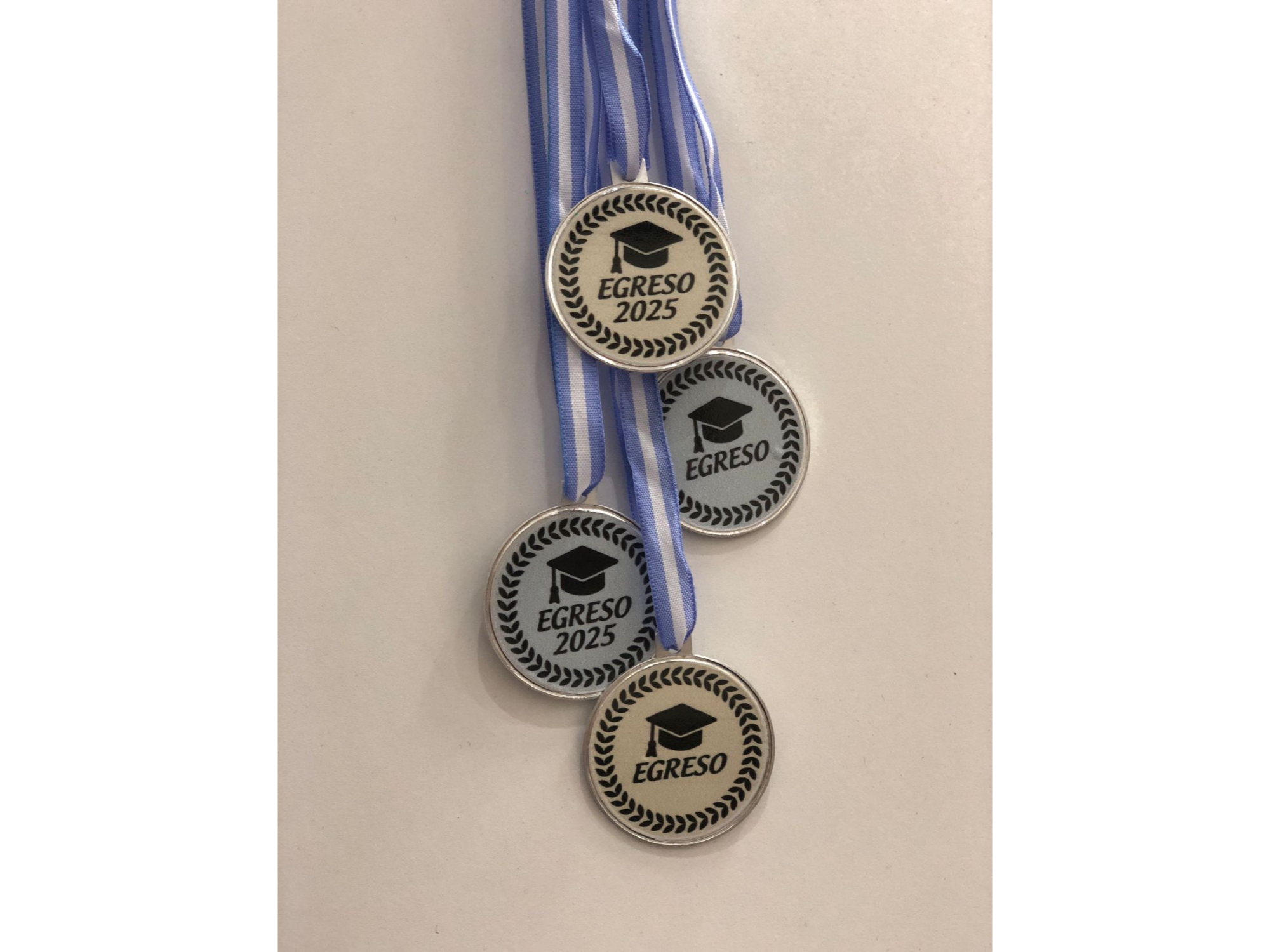 MEDALLA EGRESO UV