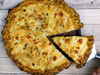 16. Pizza de zucchini con queso y fugazzeta.