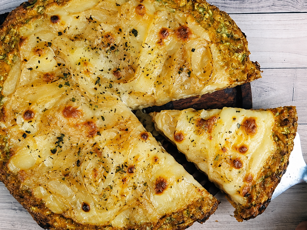 16. Pizza de zucchini con queso y fugazzeta.