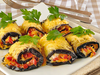 20. Rollos de berenjena rellenos con pimiento, verdeo y zanahoria.