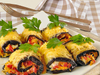 20. Rollos de berenjena rellenos con pimiento, verdeo y zanahoria.
