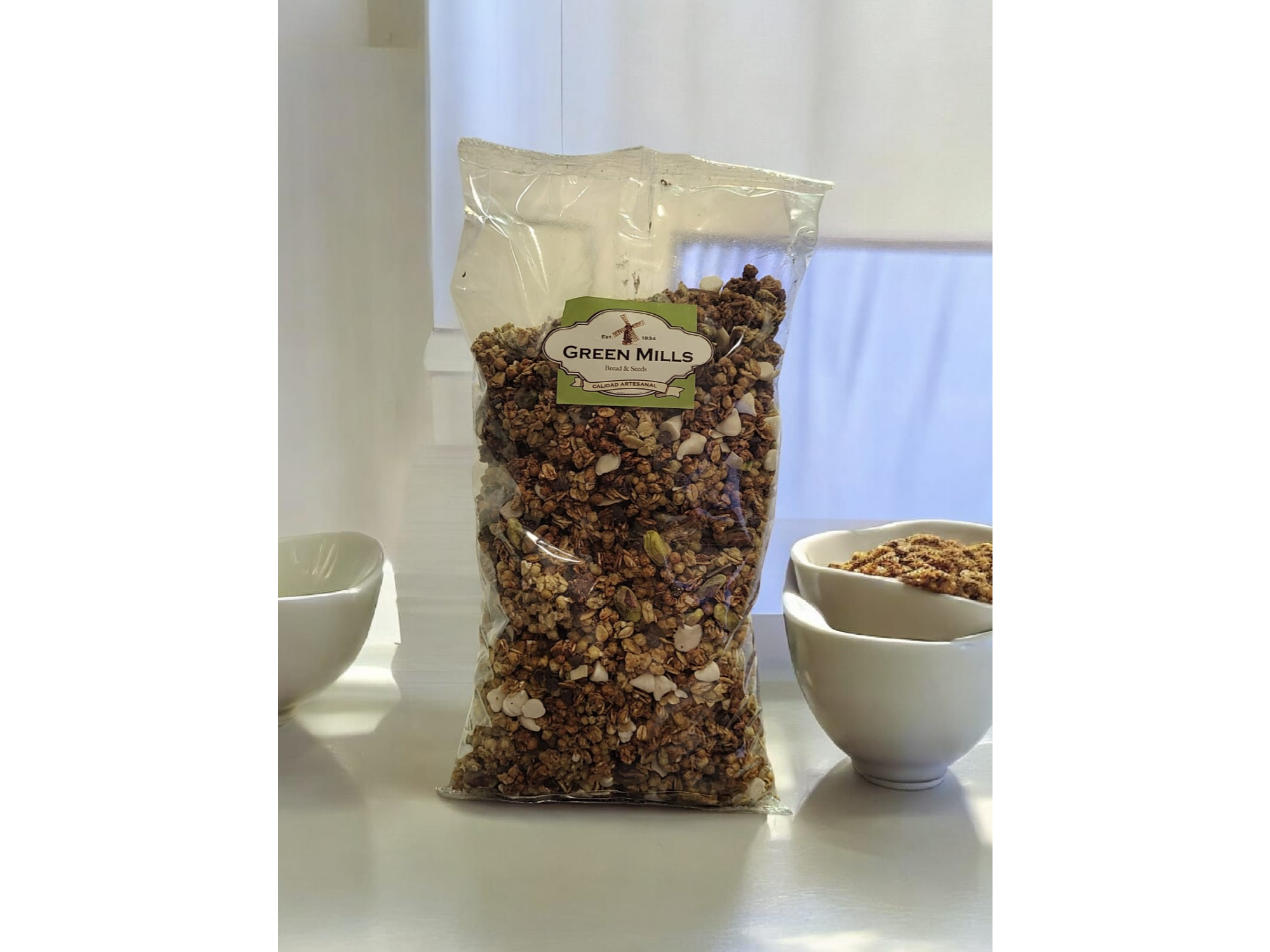 GRANOLA CRUNCHY CON PISTACHOS Y CHOCOLATE BLANCO X 1 KGS