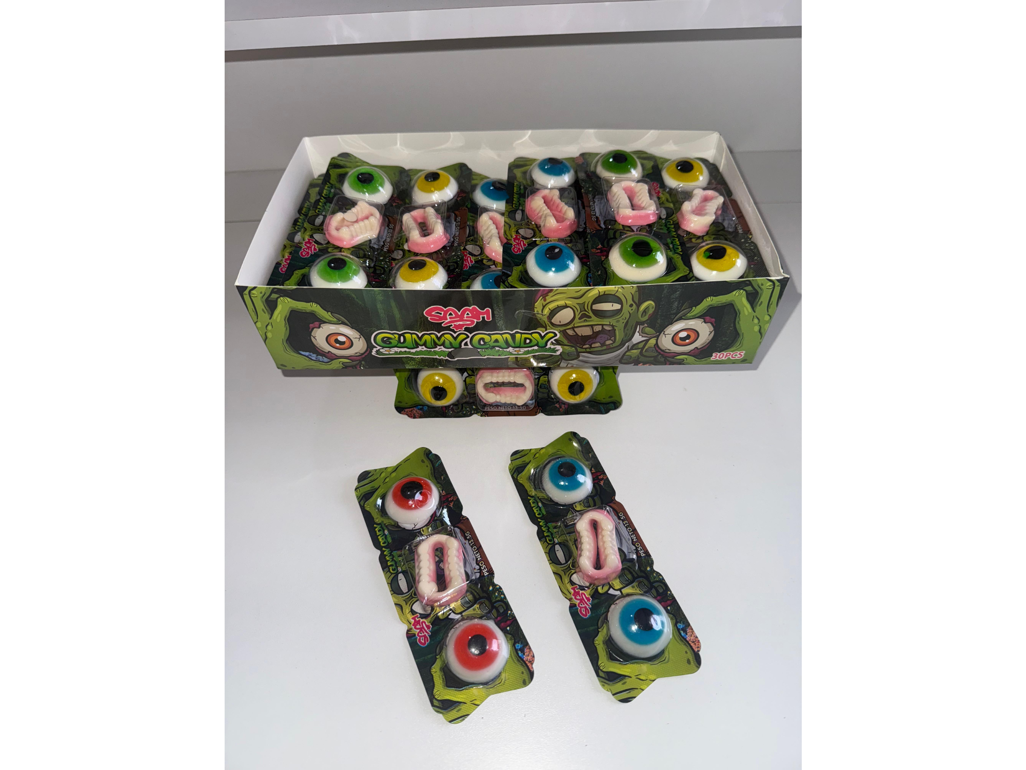 OJITOS CON DIENTES 20X30