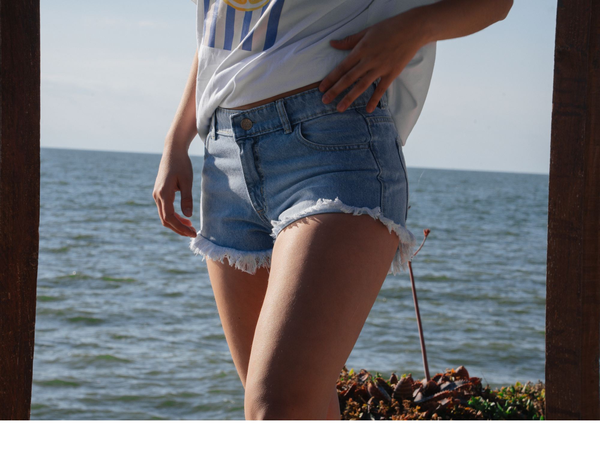MINI SHORT TIRO MEDIO CELESTE LOCALIZADO
