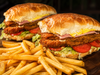 2 SANDWICH DE MILA de carne + papas + Gaseosa de 1 litro
