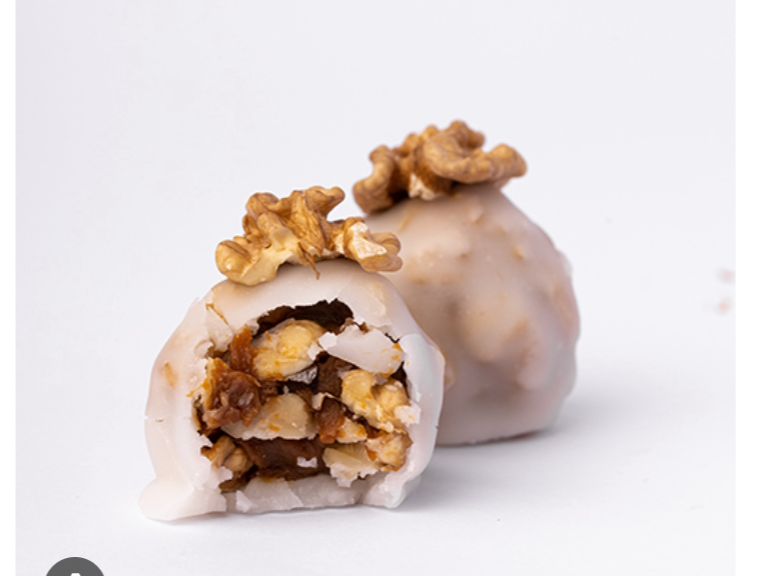 Nuez confitada blanca