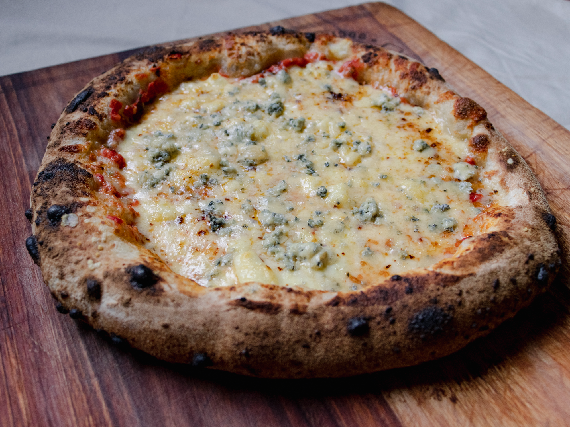 Pizza 4 Quesos x 4 porciones