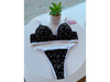 Conjunto triangulito estampdado.Negro