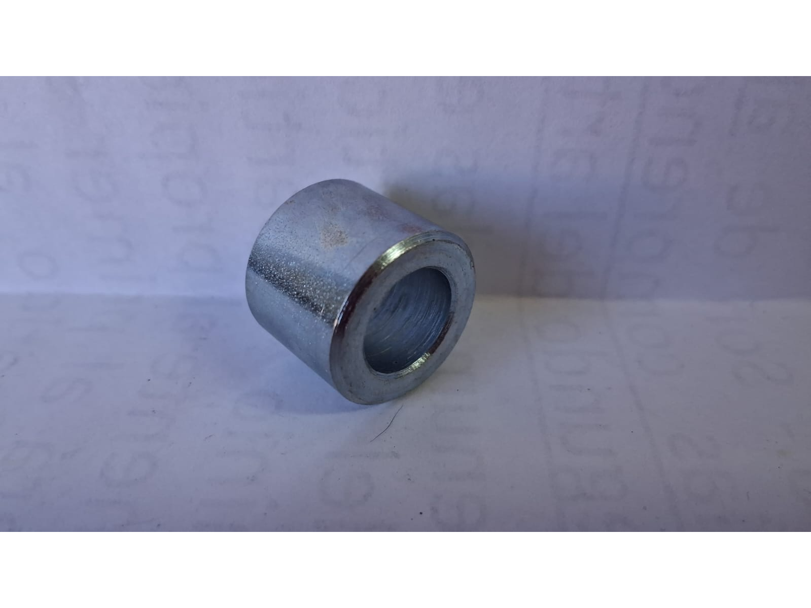 (06) BUJE SEPARADOR DELANTERO CG 125