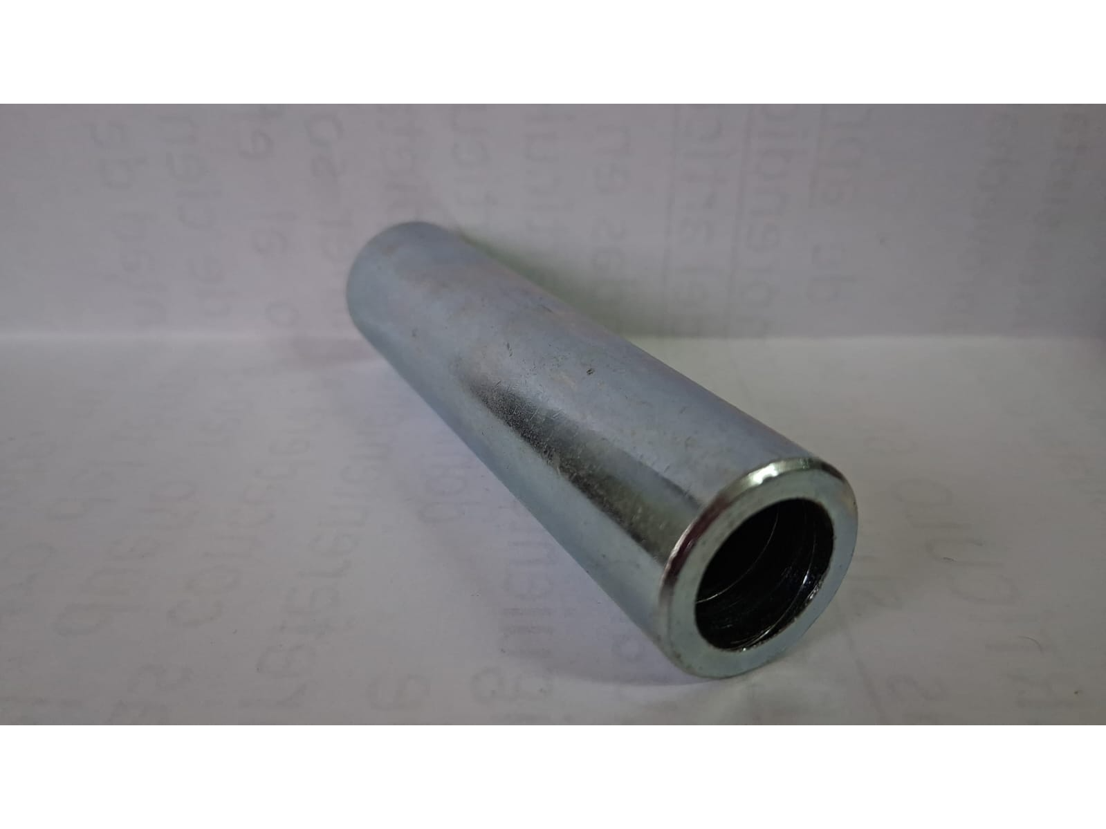 (06) BUJE SEPARADOR RUEDA TRASERA HONDA BROSS 125