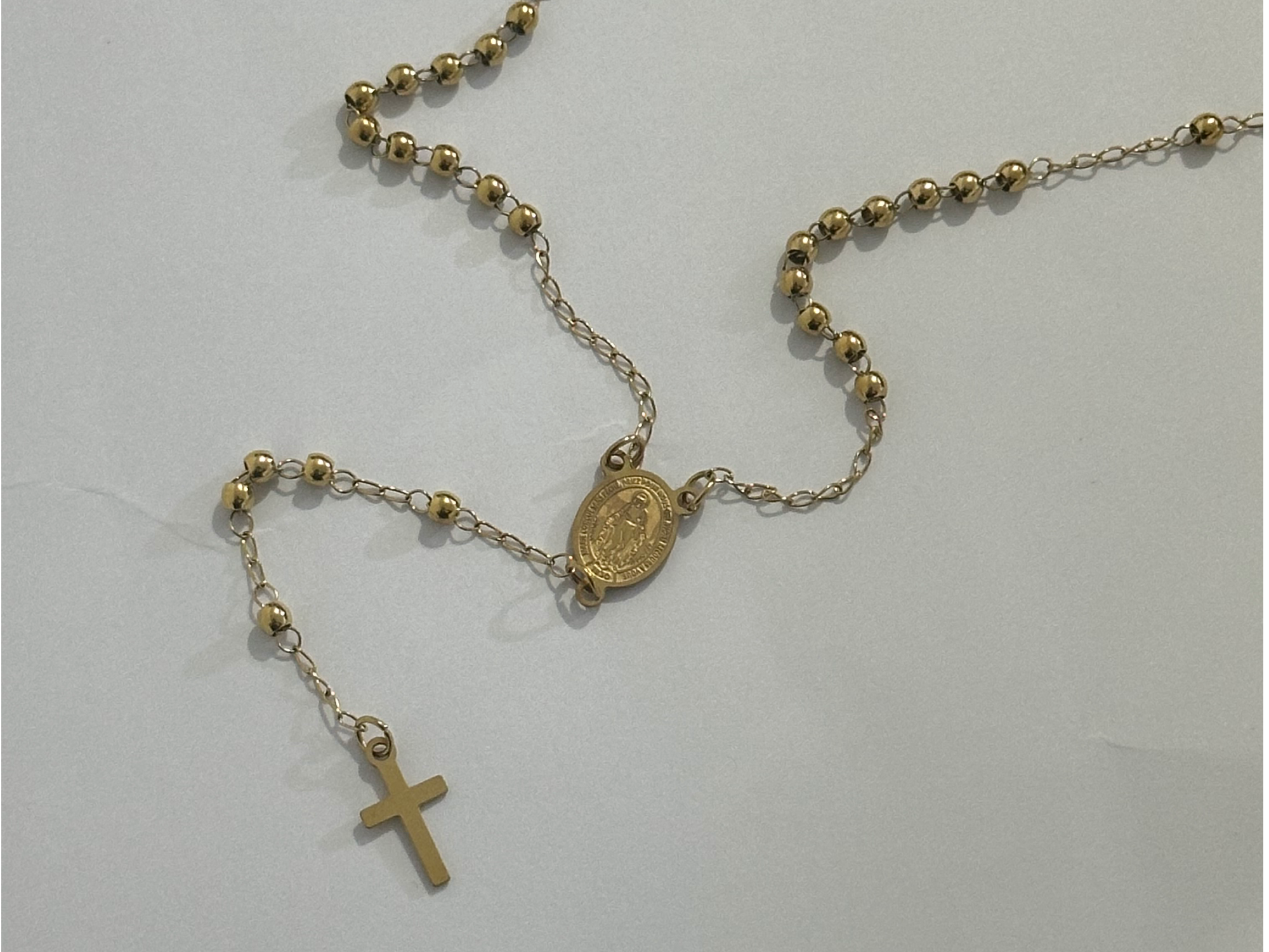 Rosario acero dorado