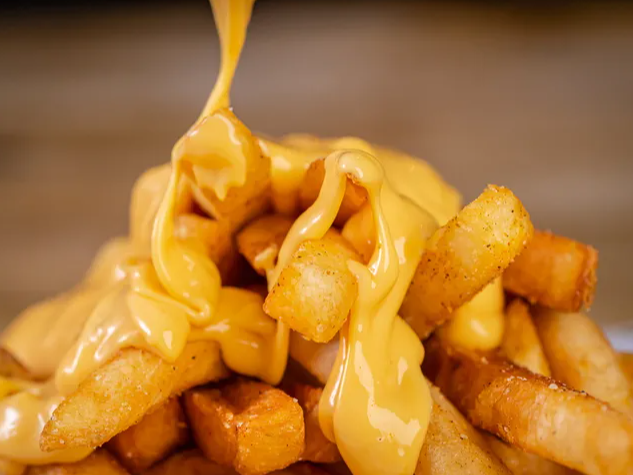 PAPAS CON CHEDDAR