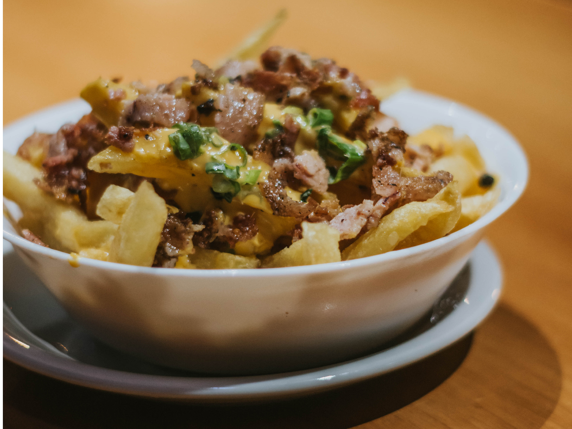 PAPAS CON CHEDDAR Y BACON