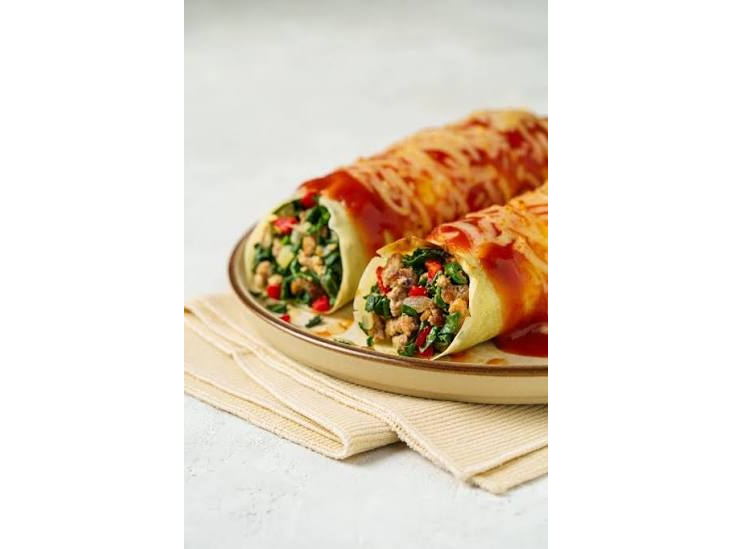 Canelones de vegetales y carne con salsa filetto