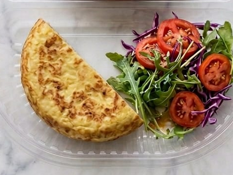 1/2 tortilla con guarnicion