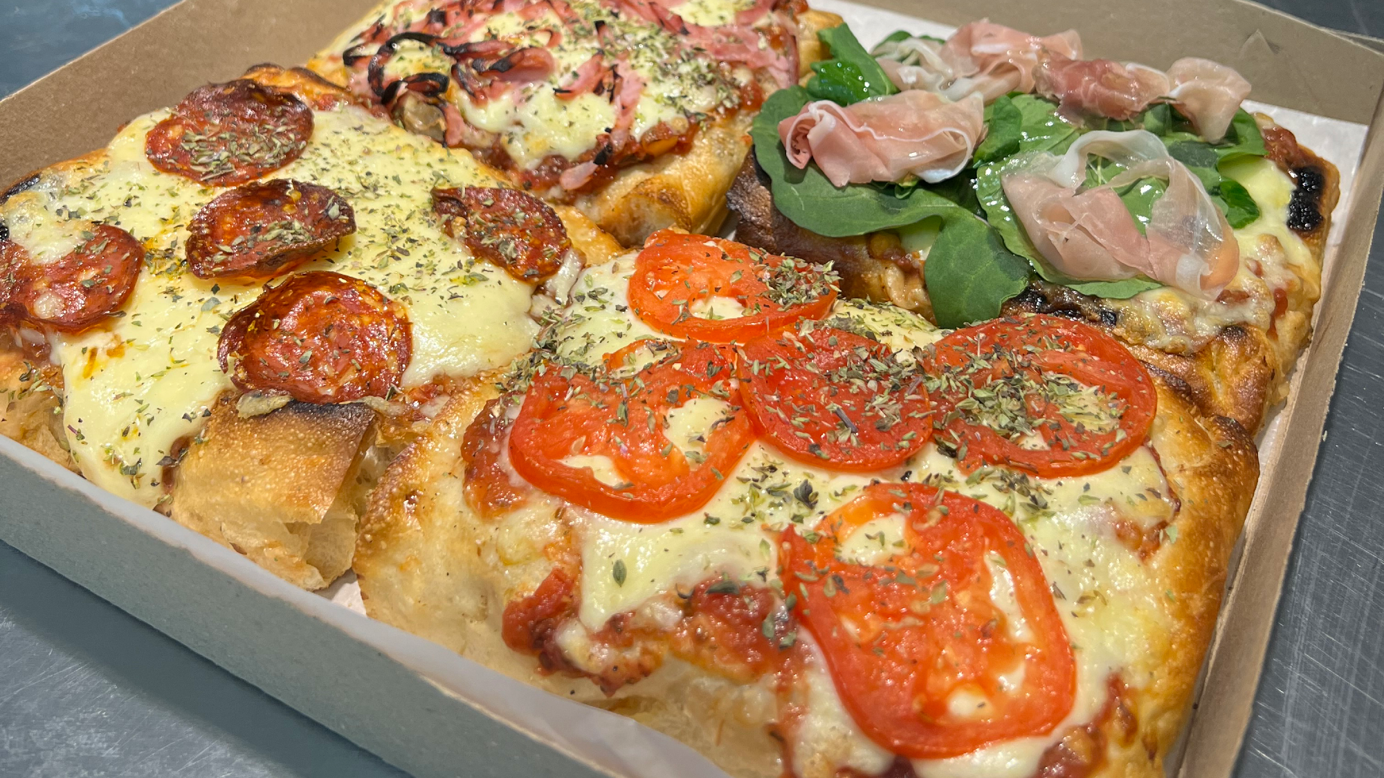 PIZZAS AL TAGLIO (AL CORTE)