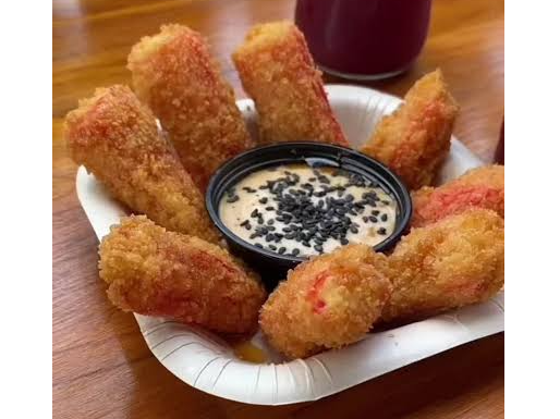 PALITOS DE KANIKAMA APANADOS MAS SALSA ACEVICHADA DE 2 ONZAS