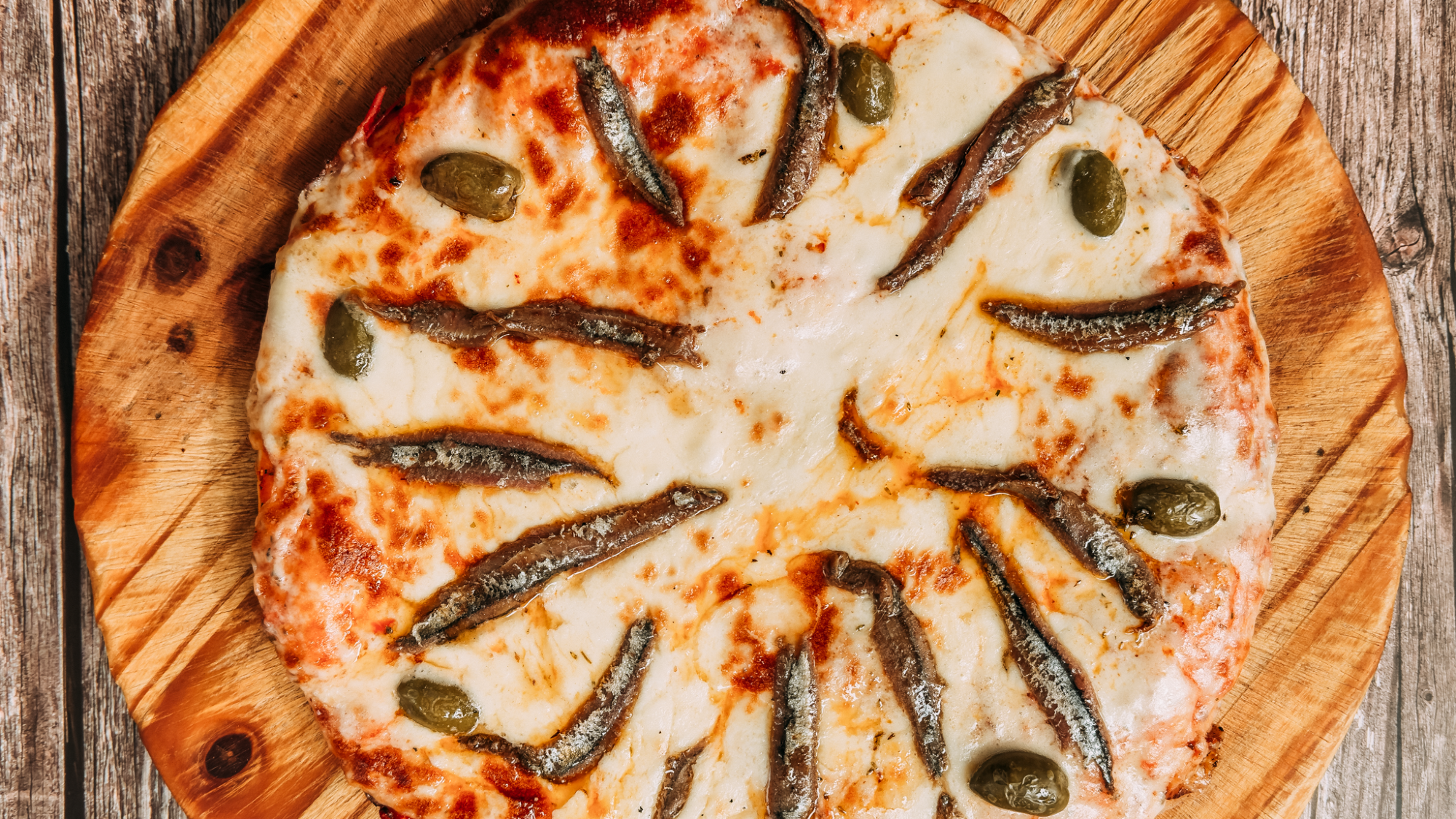PIZZAS