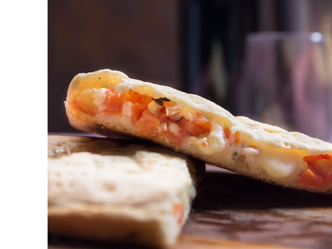 Calzoni porchetta y pimientos