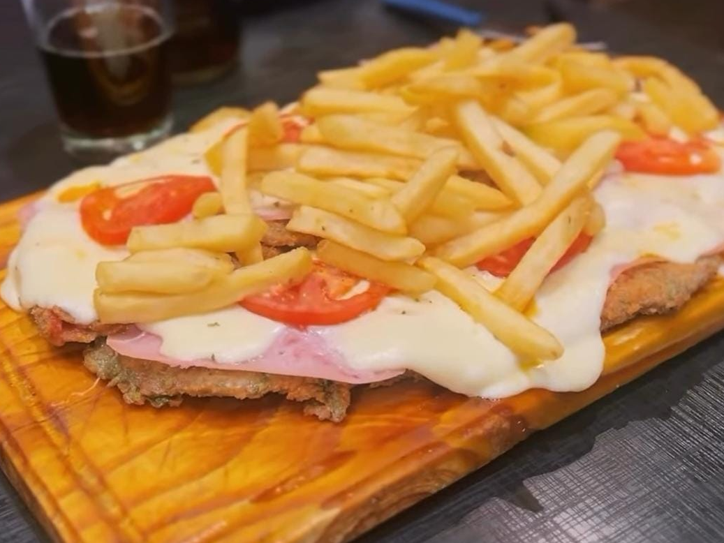 Milanesa  a la Napolitada P/3 con papas crujientes