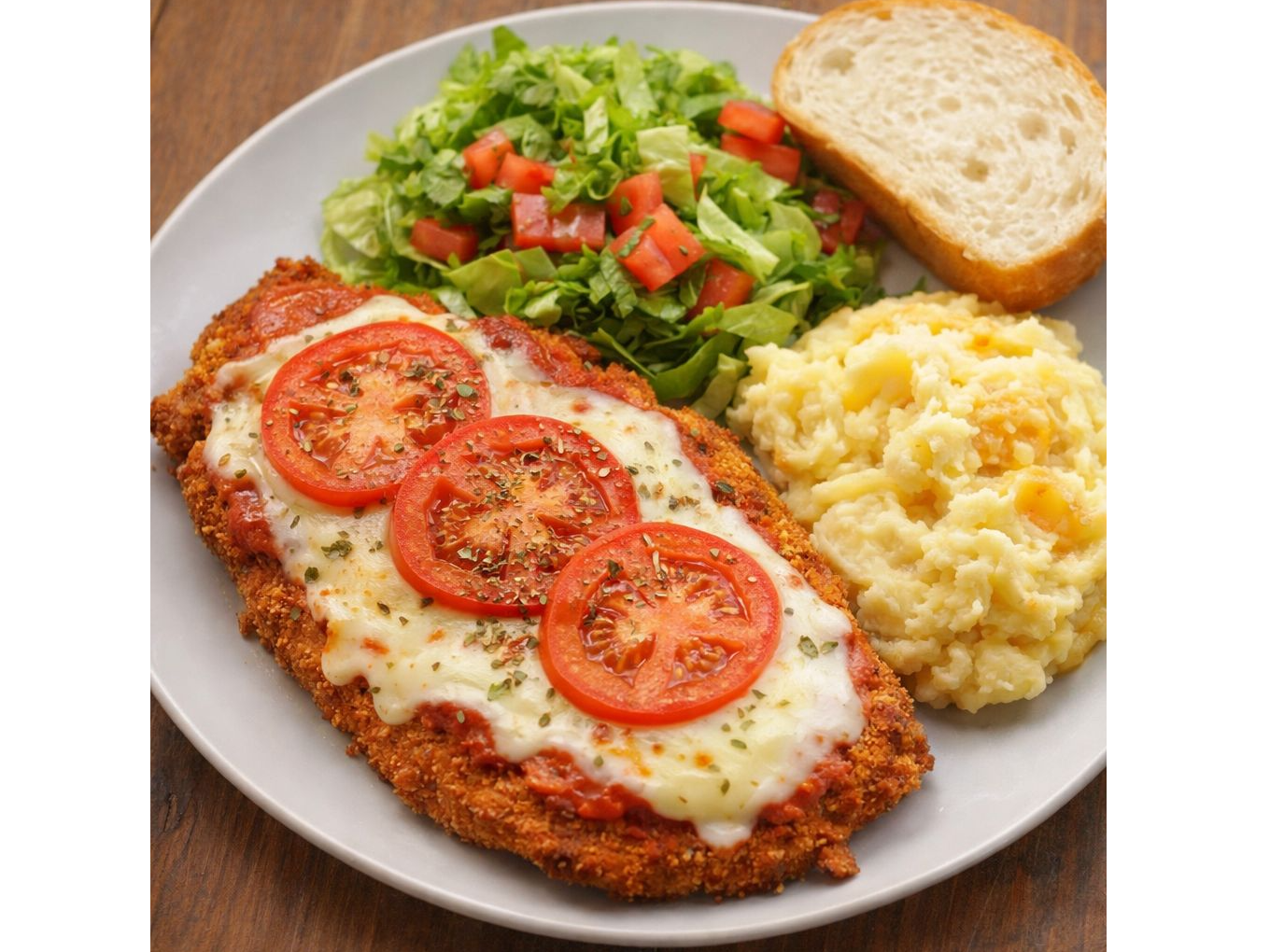 MILA NAPOLITANA CON PURE DE PAPA + ENSALADA Y PAN