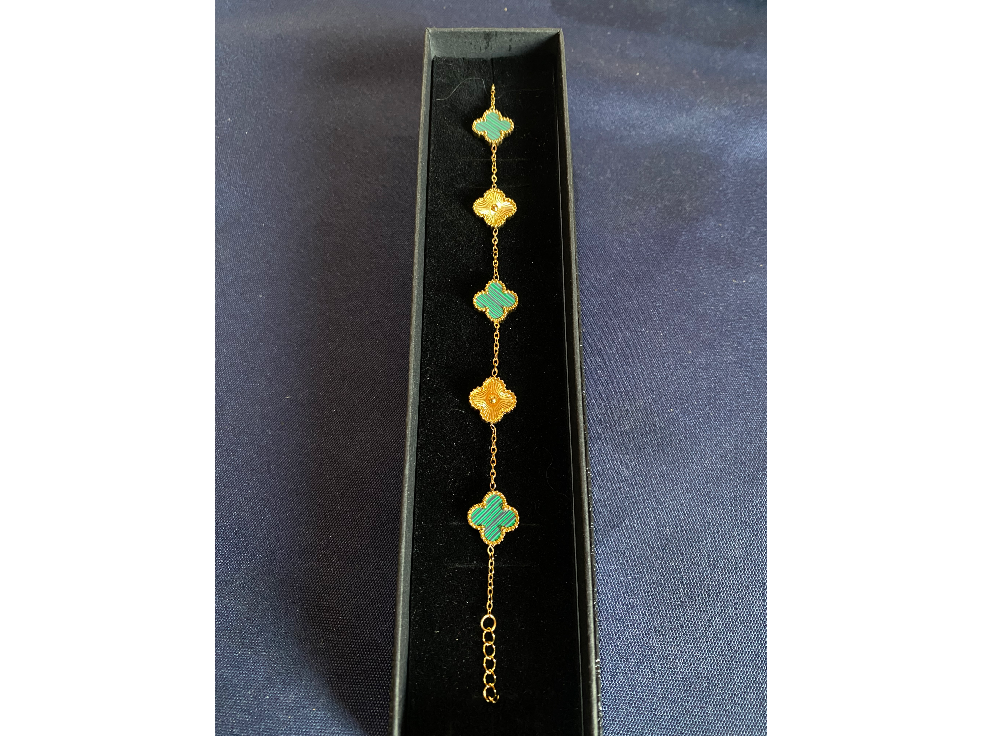 Pulcera van cleef trebol verde y oro