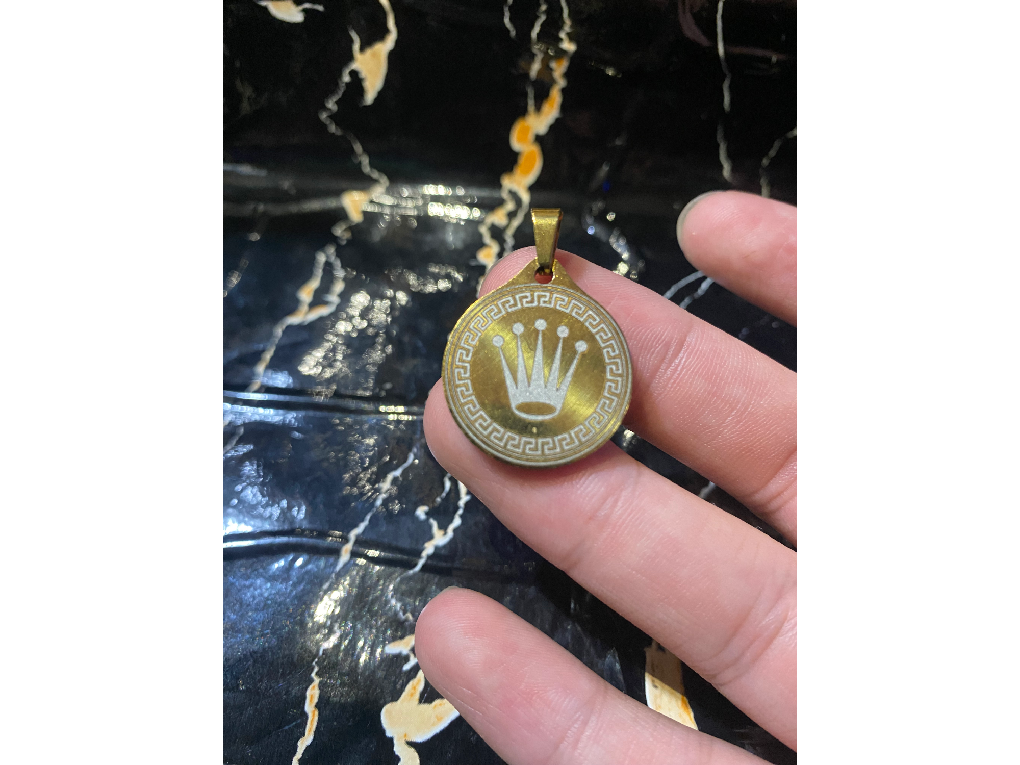 Dije de la corona