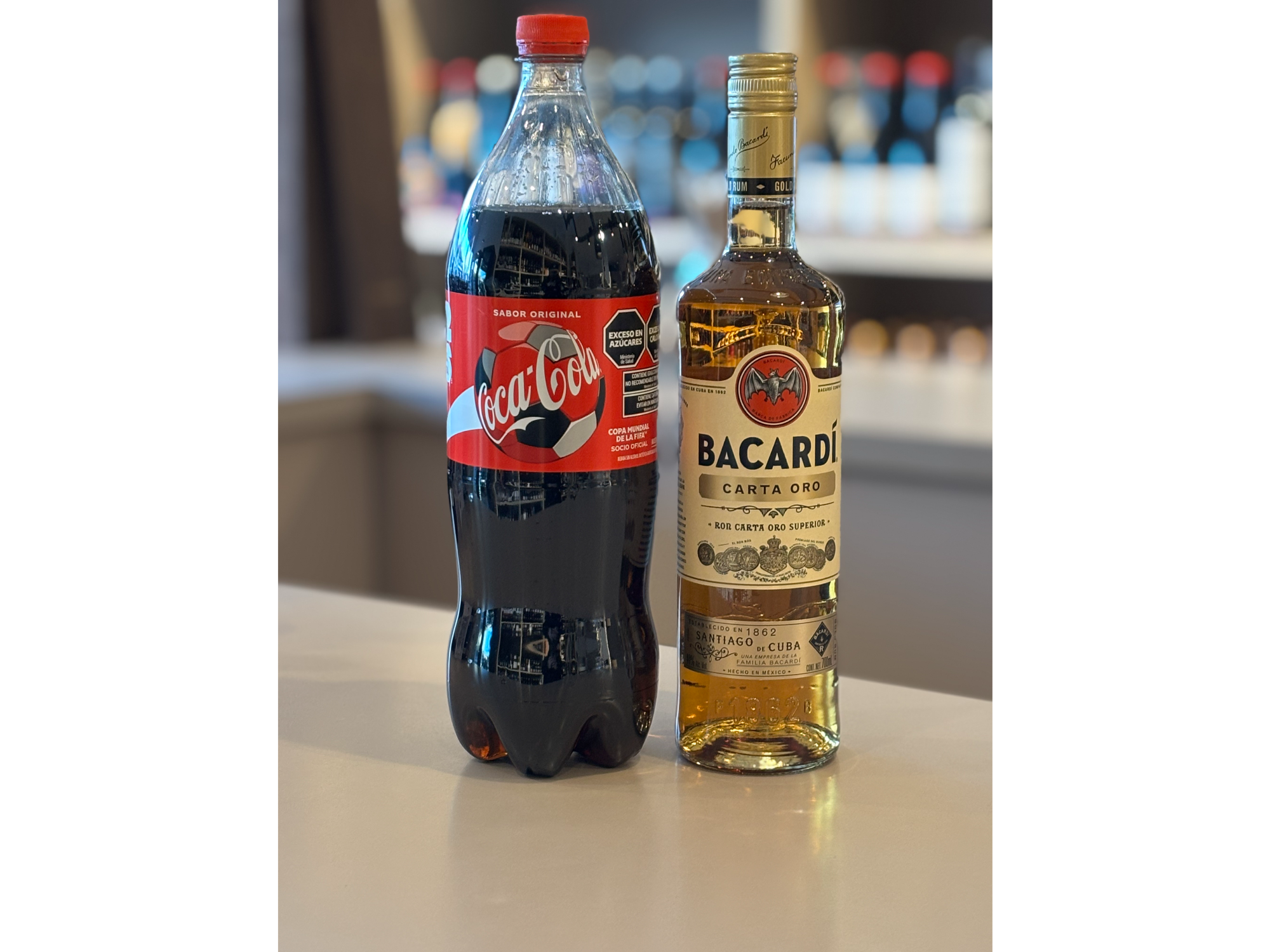 Bacardi + Coca