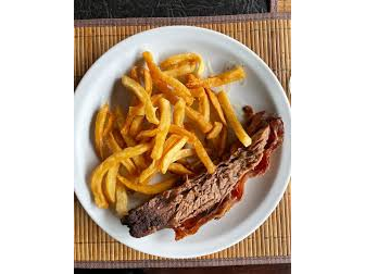 Vacío al horno , con papas fritas