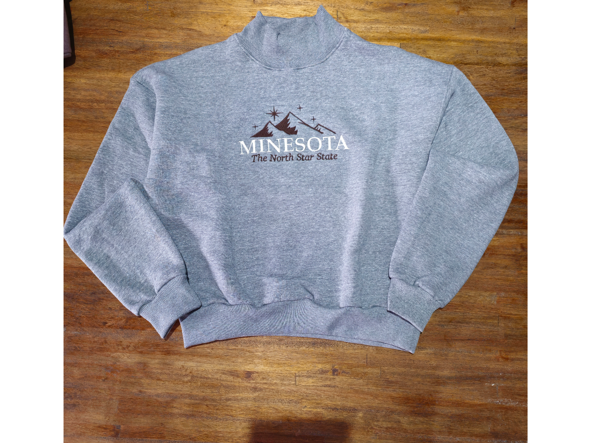 BUZO CUELLO ALTO MINESOTA GRIS