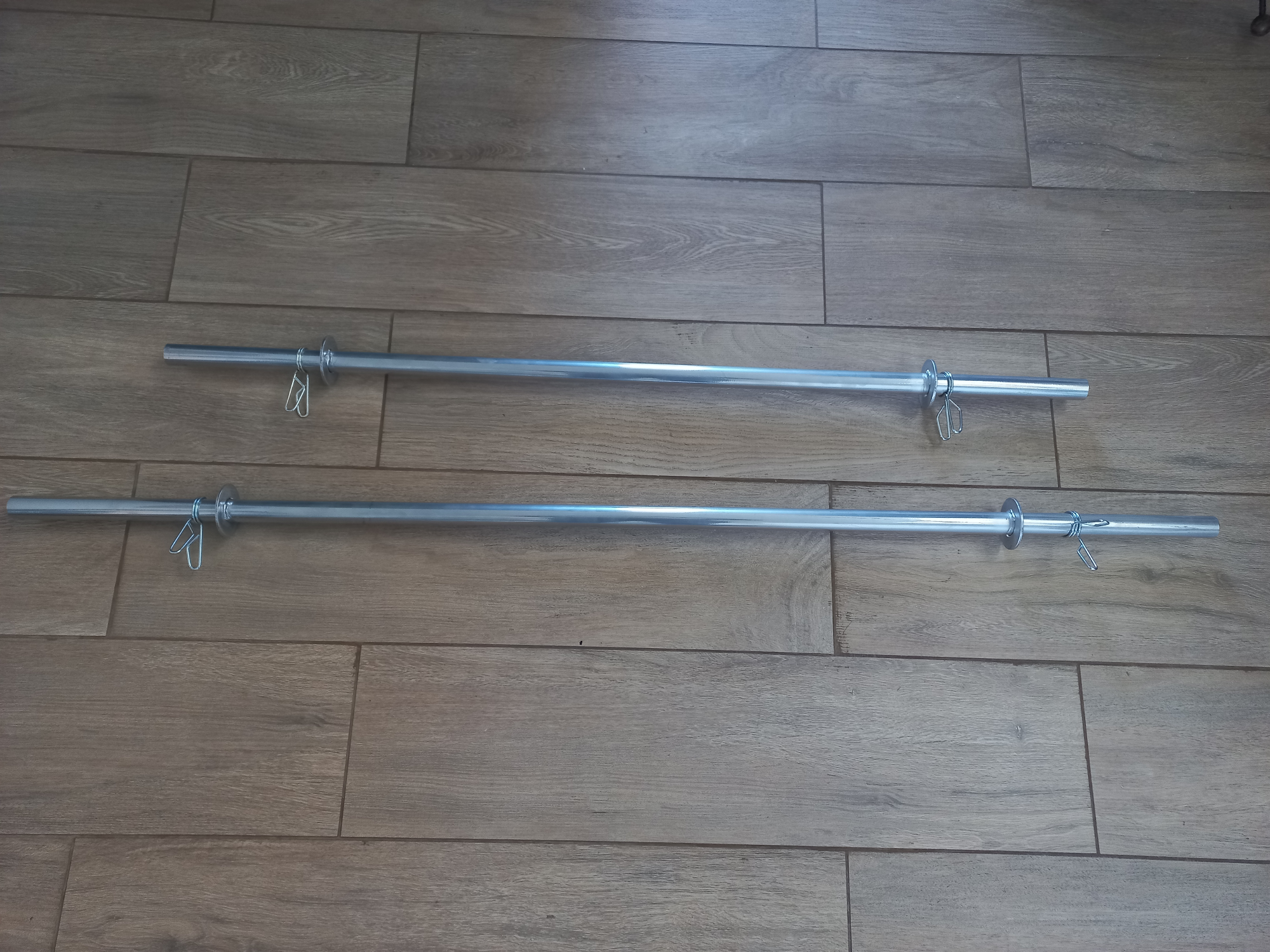 Barra hueca de 1,20 m con topes