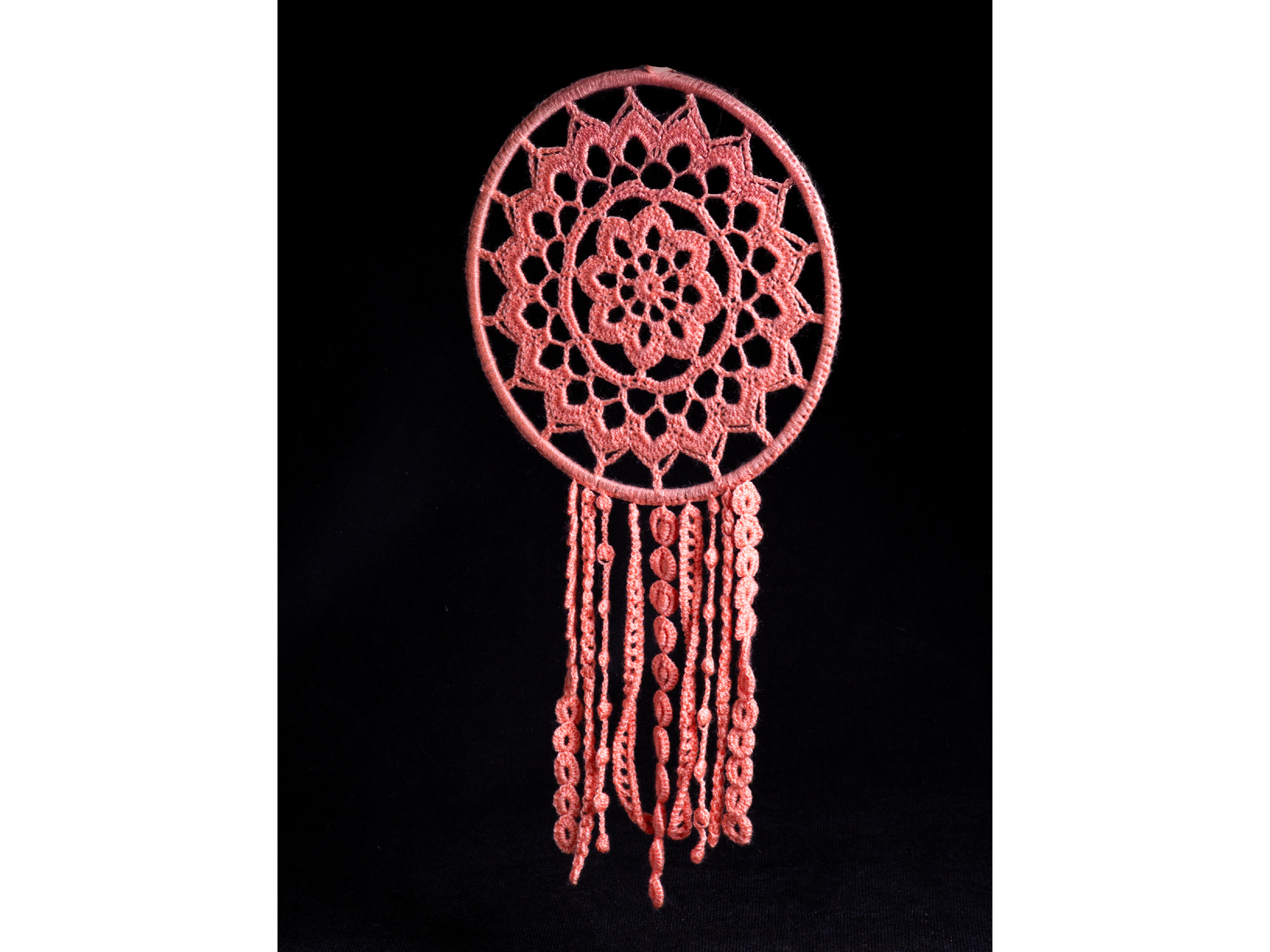 Atrapasueños tejido rosado con rulos