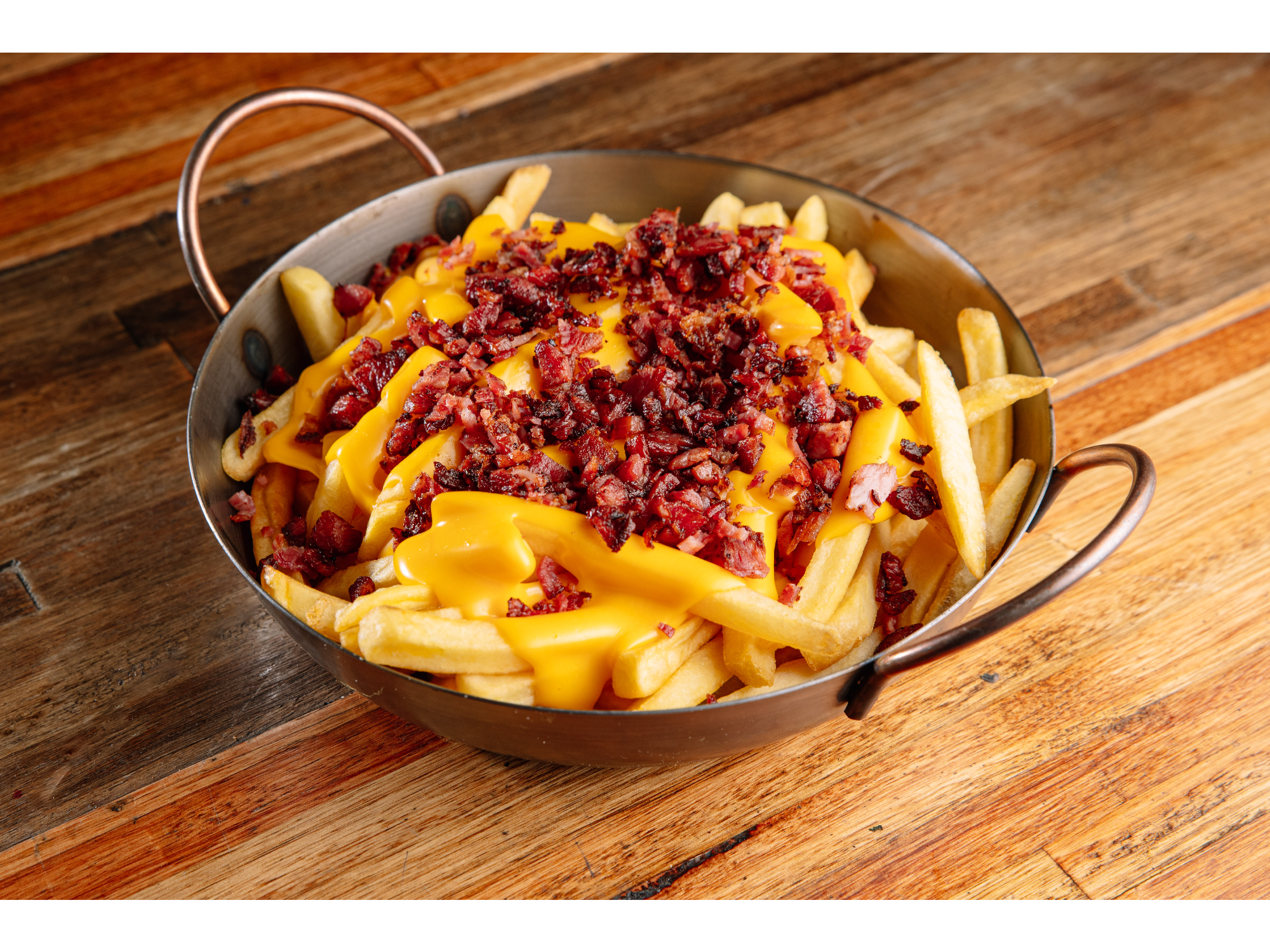 PAPAS CON CHEDDAR Y BACON